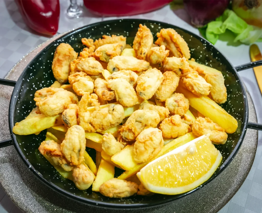 Midii pe pat de cartofi